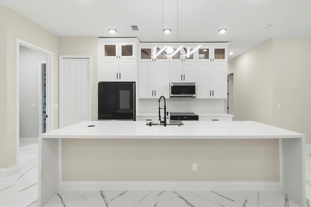 1143 SW Estaugh Avenue, Port St. Lucie, FL 34953
