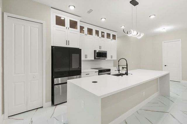 1143 SW Estaugh Avenue, Port St. Lucie, FL 34953