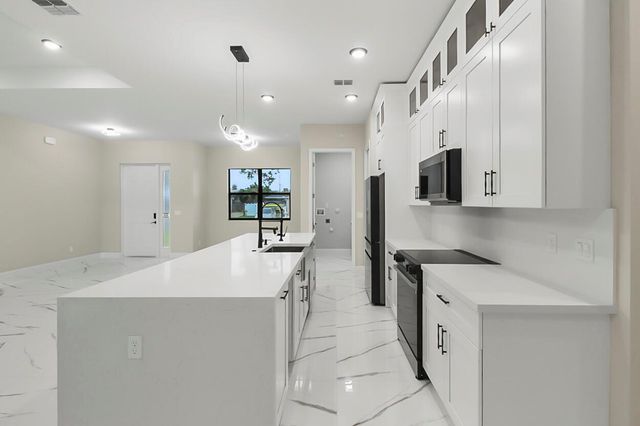 1143 SW Estaugh Avenue, Port St. Lucie, FL 34953