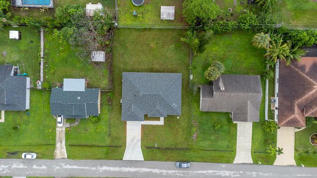 1143 SW Estaugh Avenue, Port St. Lucie, FL 34953