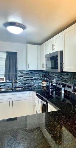 9431 Live Oak Pl 408, Davie, FL 33324