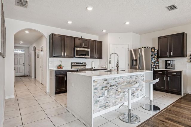 1073 PRESERVE DRIVE, Davenport, FL 33896