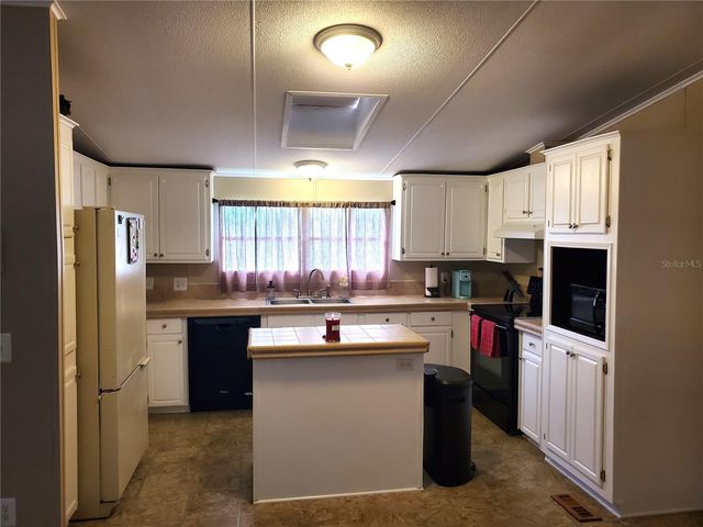 4902 COUNTRY TRAILS DRIVE, Polk City, FL 33868