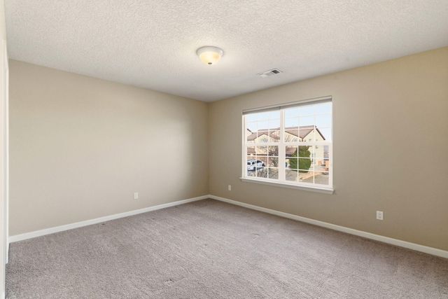 213 Paseo Vista Loop NE, Rio Rancho, NM 87124