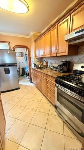 77-03 95th Avenue, Ozone Park, NY 11416