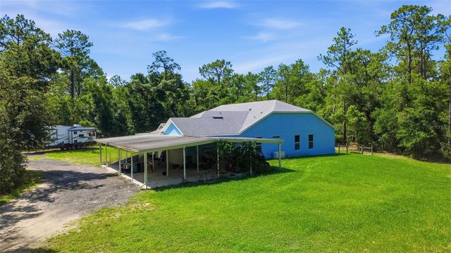 922 VOLUSIA TIMBER COURT, Lake Helen, FL 32744