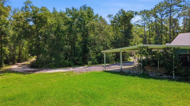 922 VOLUSIA TIMBER COURT, Lake Helen, FL 32744