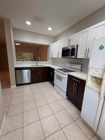 5145 Palmbrooke Circle, West Palm Beach, FL 33417