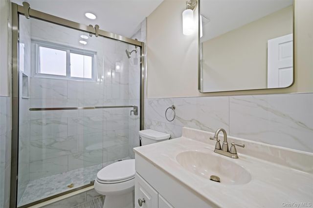 8 Elwood Road, Centereach, NY 11720