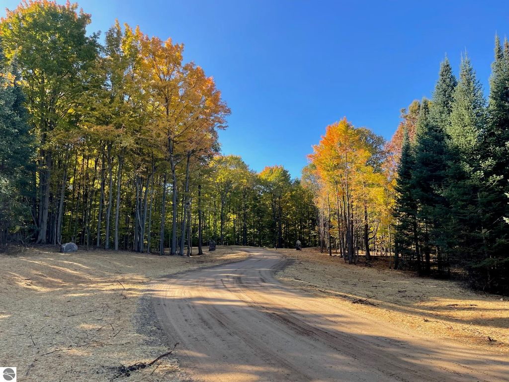 Image 2 of property listing at 5803 SW Old Oak Trail, Fife Lake, MI 49633