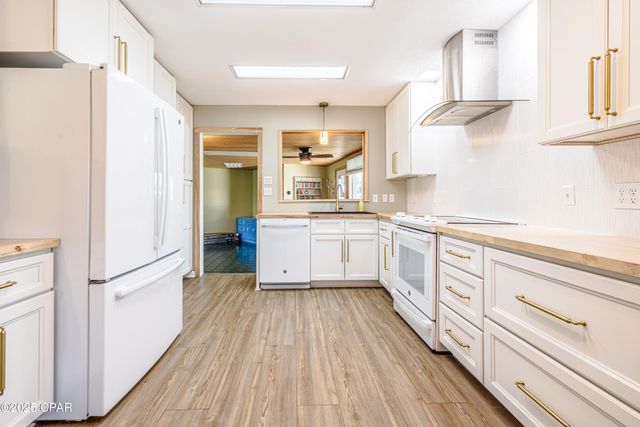 001 Dolphin Lane, Panama City Beach, FL 32408