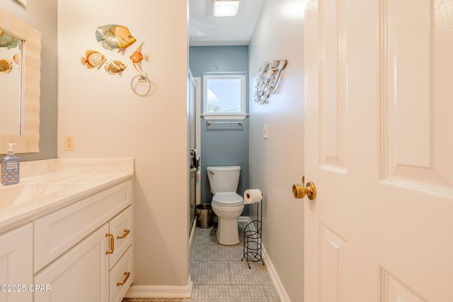 001 Dolphin Lane, Panama City Beach, FL 32408