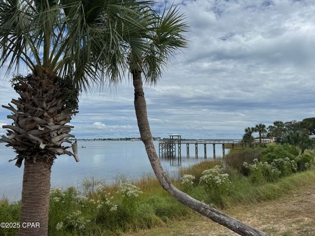 001 Dolphin Lane, Panama City Beach, FL 32408