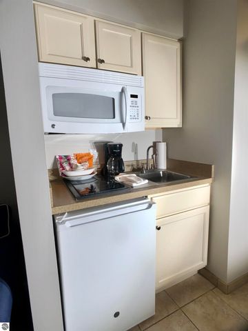 5631 Creeks Crossing, Williamsburg, MI 49690