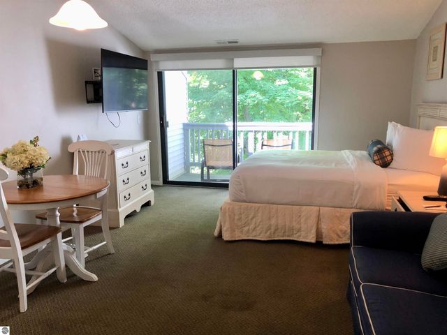 5631 Creeks Crossing, Williamsburg, MI 49690