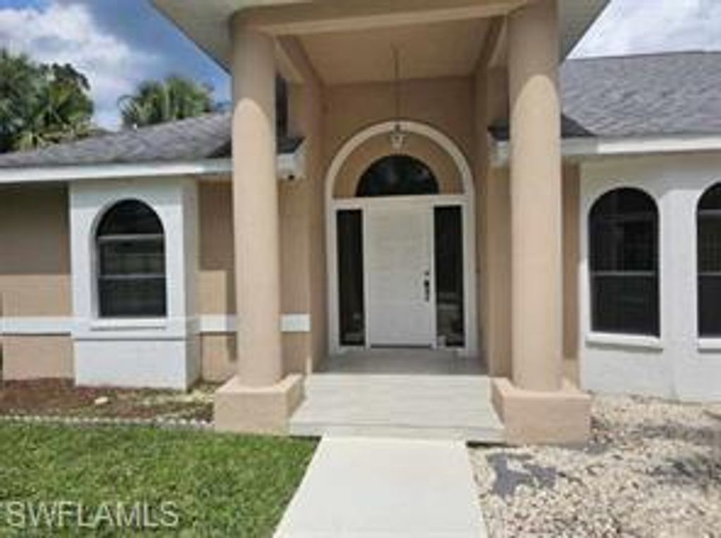 718 Jefferson AVE, LEHIGH ACRES, FL 33936 — exterior