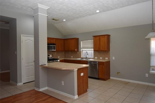 9518 Brackenton Crest Drive, Spring, TX 77379