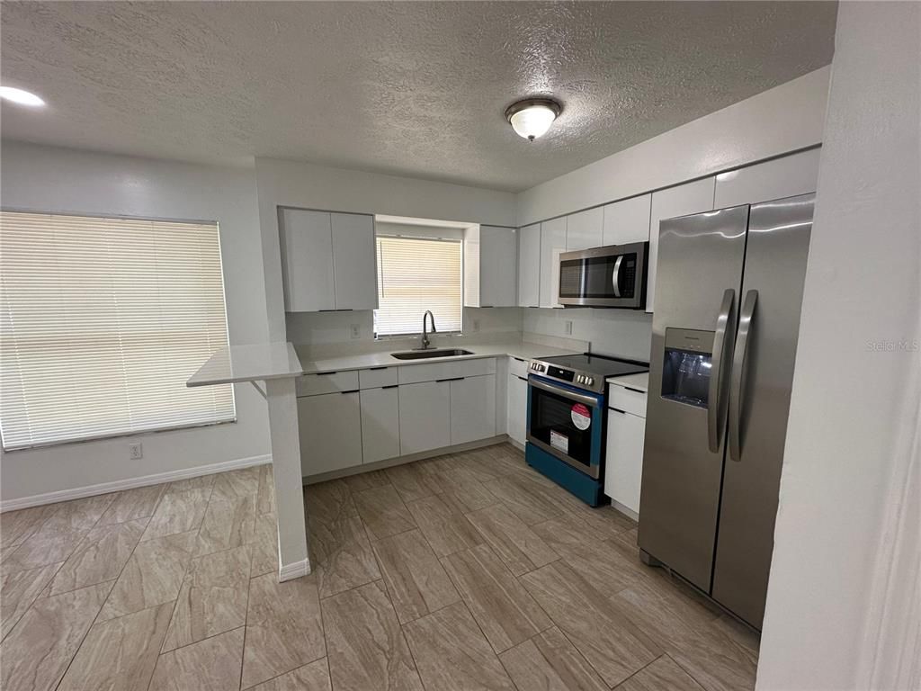 Image 5 of property listing at 5921 NW 9TH STREETS 5911, Ocala, FL 34482