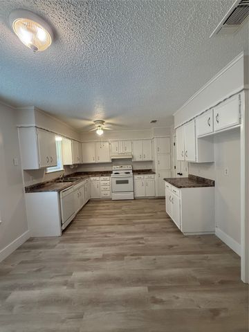 2409 Caprice Avenue, Denison, TX 75020