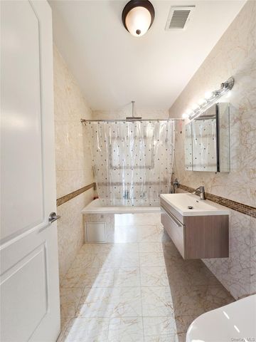 63-36 99 Sreet 8C, Rego Park, NY 11374