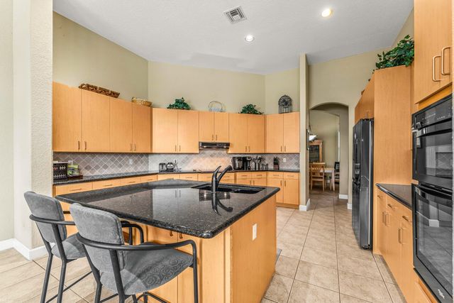 10487 Cypress Lakes Preserve Drive, Lake Worth, FL 33449