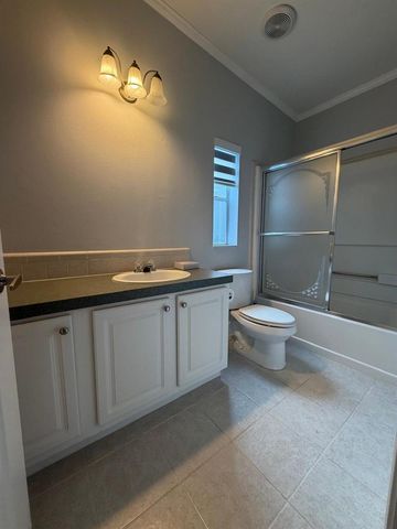 4165 3rd Court, Atlantis, FL 33462