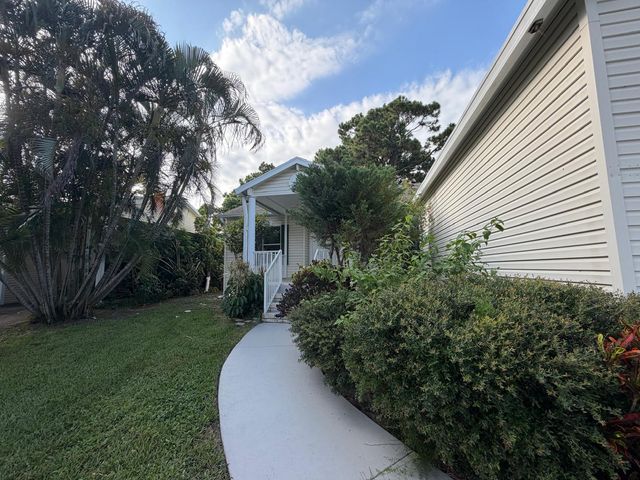 4165 3rd Court, Atlantis, FL 33462