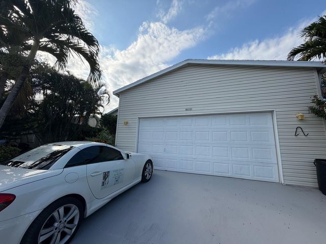 4165 3rd Court, Atlantis, FL 33462