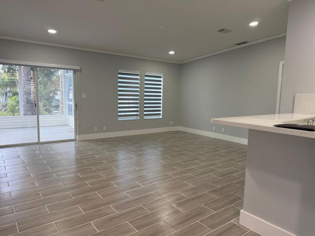 4165 3rd Court, Atlantis, FL 33462