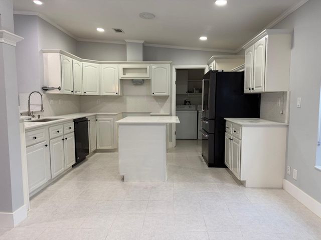 4165 3rd Court, Atlantis, FL 33462