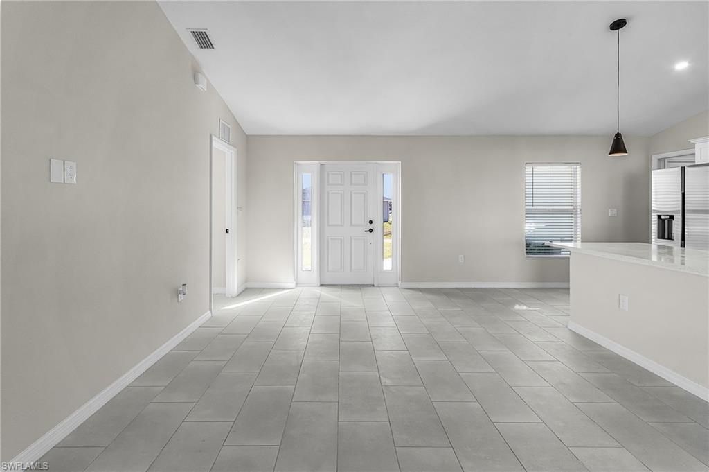 Image 8 of property listing at 2003 NE 27th ST, Cape Coral, FL 33909