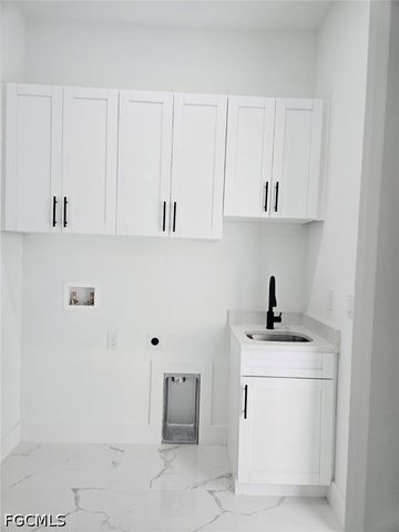 1202 Wellington AVE, Lehigh Acres, FL 33972