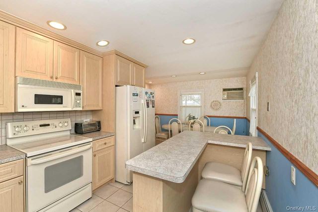 203 Saddle Lane, Levittown, NY 11756