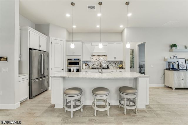 7631 Winding Cypress DR, Naples, FL 34114