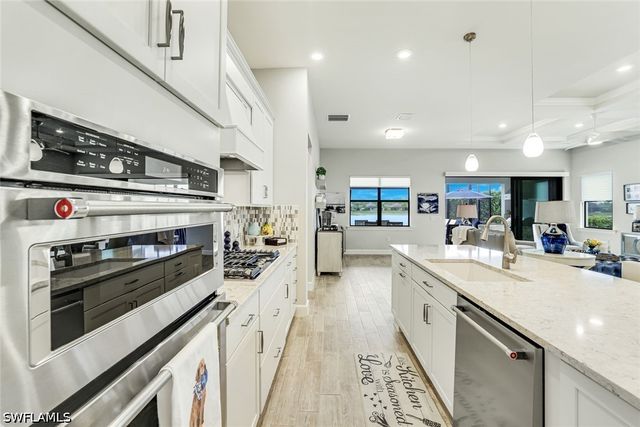 7631 Winding Cypress DR, Naples, FL 34114