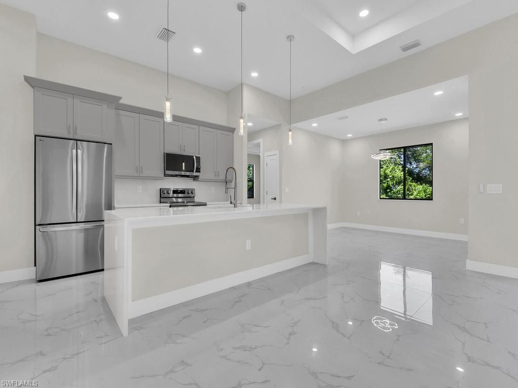 1304 WILLIAMS AVE, LEHIGH ACRES, FL 33972 — photo 2