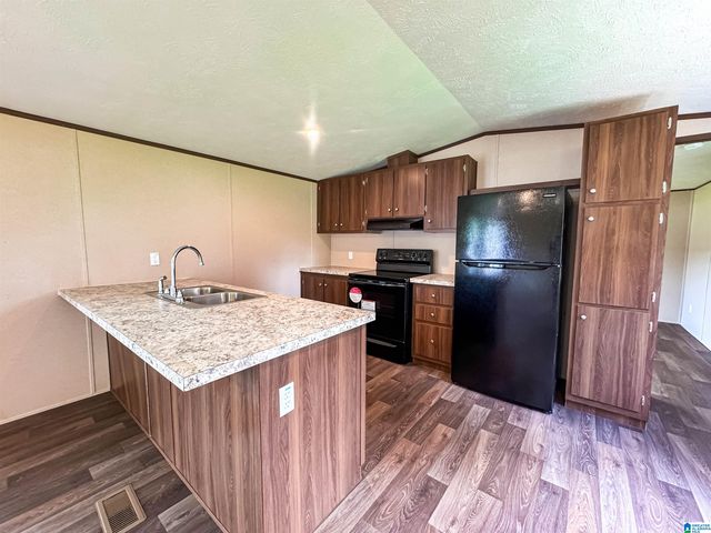 1306 RUSSELL DRIVE, Weaver, AL 36277