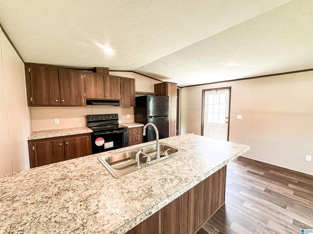 1306 RUSSELL DRIVE, Weaver, AL 36277