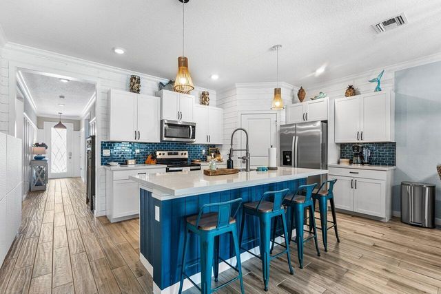 1614 NE White Pine Terrace, Ocean Breeze, FL 34957