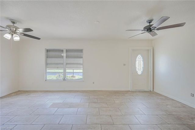 63 Tangelo CT, Lehigh Acres, FL 33936