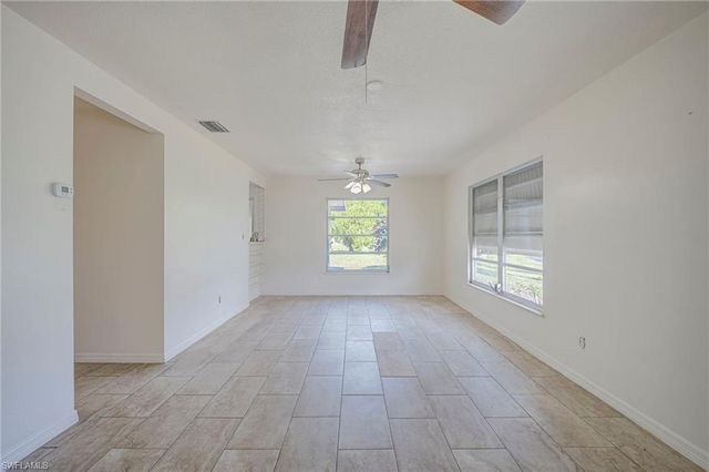 63 Tangelo CT, Lehigh Acres, FL 33936