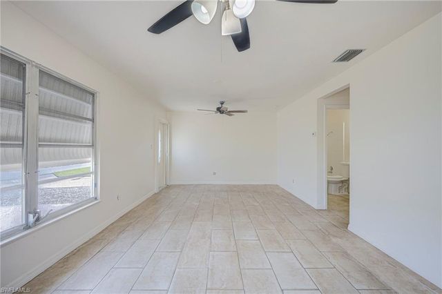 63 Tangelo CT, Lehigh Acres, FL 33936
