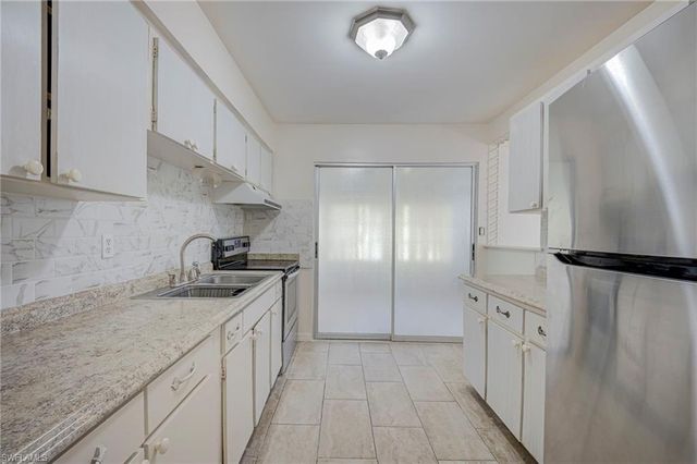 63 Tangelo CT, Lehigh Acres, FL 33936