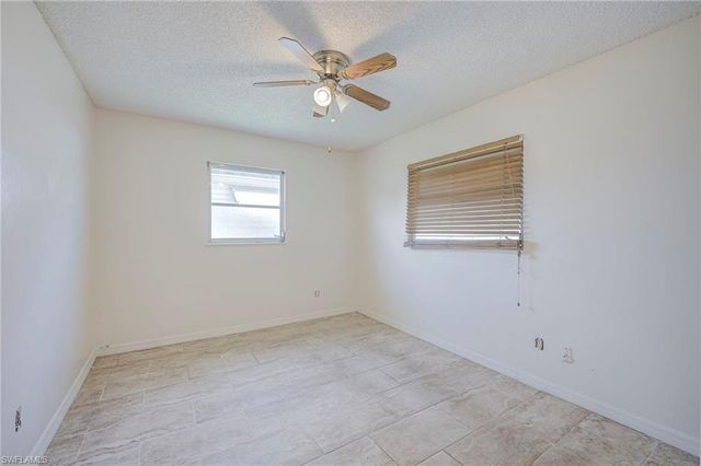 63 Tangelo CT, Lehigh Acres, FL 33936