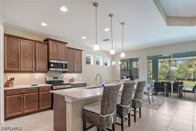 14586 Tropical DR, Naples, FL 34114