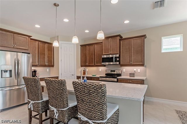 14586 Tropical DR, Naples, FL 34114