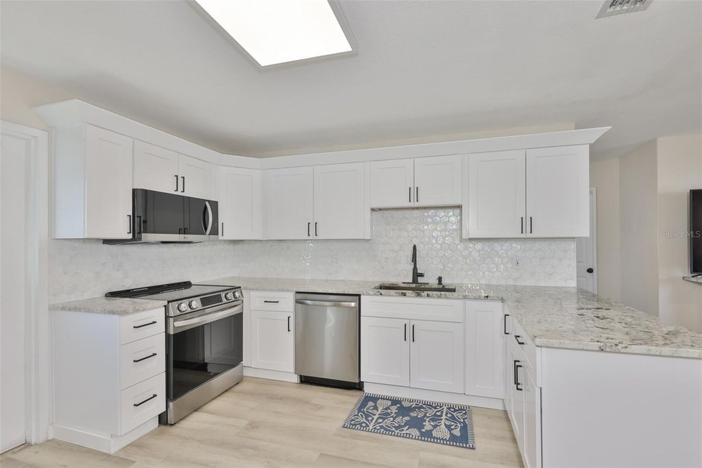 Image 3 of property listing at 4718 W OKLAHOMA AVENUE, Tampa, FL 33616