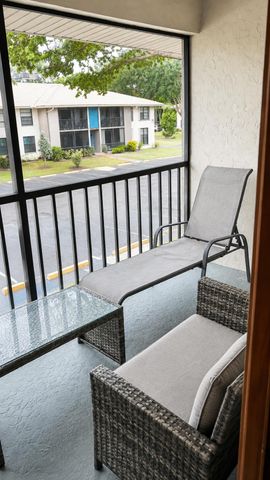 9780 PINEAPPLE TREE Drive 207, Boynton Beach, FL 33436