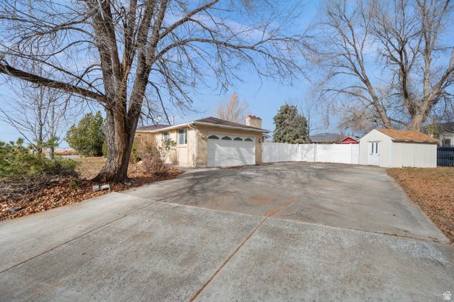 2455 S BLUFF RD, Syracuse, UT 84075