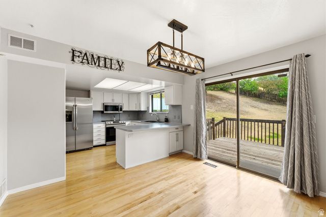 9057 S CHERBOURG PL, Sandy, UT 84093